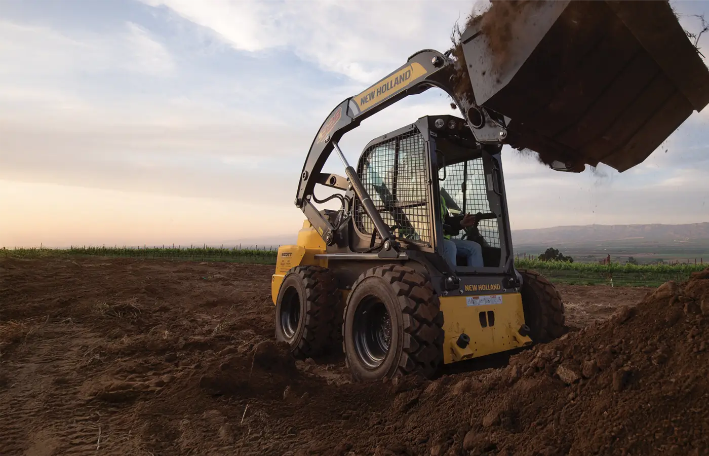 New Holland Skid Steer with Bucket Lifted